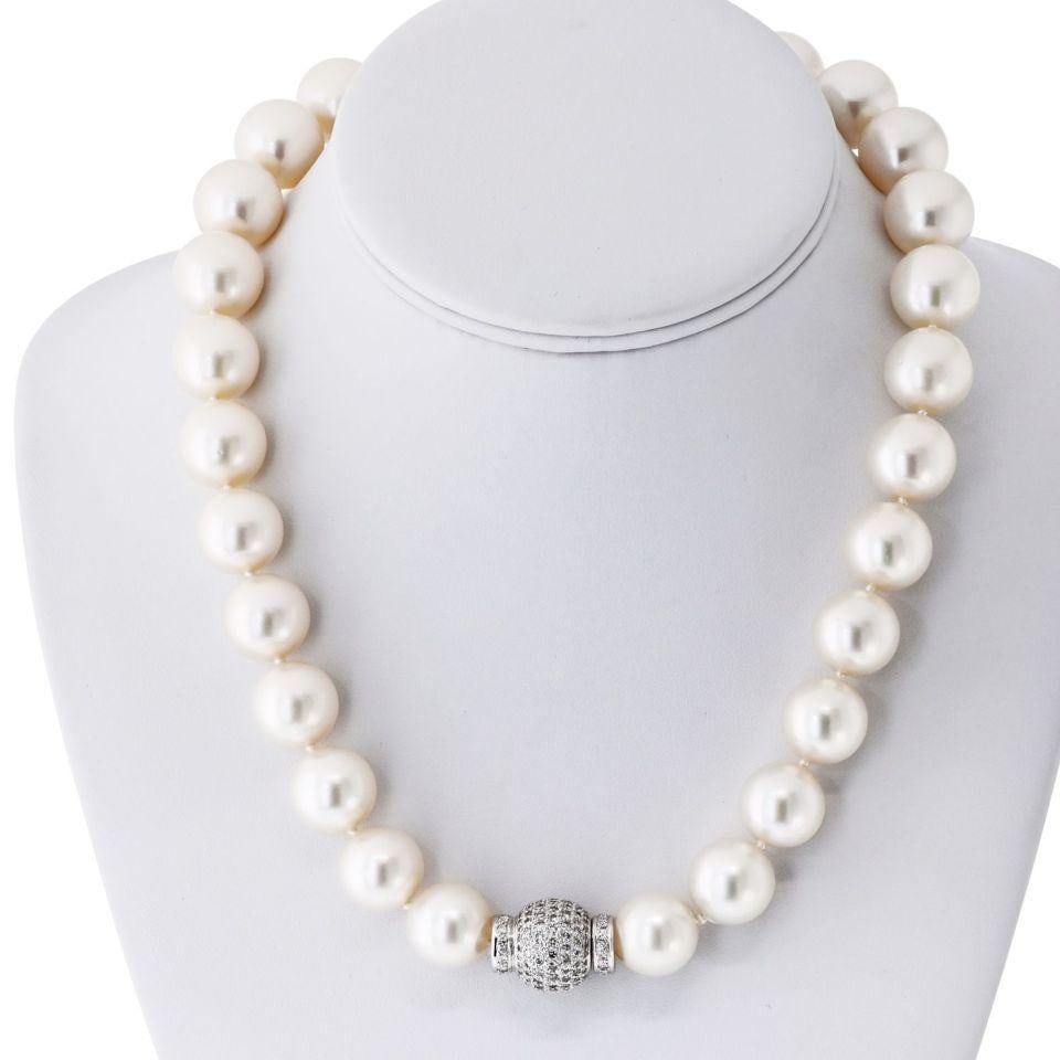 South Sea Pearl Necklace with Diamond Clasp in 18K White Gold 18 Inch Strand: South Sea Pearl Necklace with Diamond Clasp in 18K White Gold 18 Inch Strand This vintage South Sea pearl necklace features lustrous pearls measuring approximately 13 to 17 mm, strung on an 18-inch st