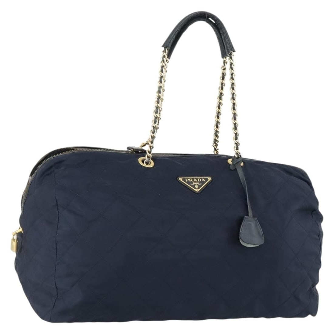 Prada navy nylon tote with padlock and key set: Prada navy nylon tote with padlock and key set This PRADA chain tote bag is crafted from navy nylon with gold accents and features a spacious design suitable for daily use. The bag includes a padlock,