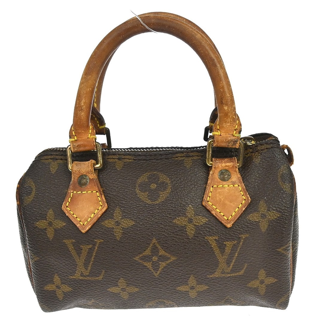 Louis Vuitton Speedy Mini Monogram Canvas Handbag M41534: Louis Vuitton Speedy Mini Monogram Canvas Handbag M41534 This Louis Vuitton Mini Speedy handbag features the iconic monogram canvas leather exterior in brown, complemented by a zip closure and a compa