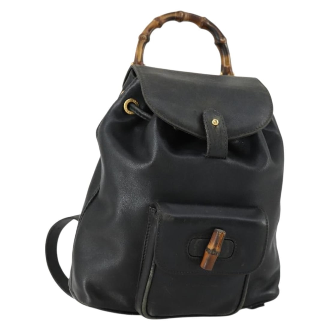 Black Leather Bamboo Backpack by Gucci 003 2034 0030 Italy: Black Leather Bamboo Backpack by Gucci 003 2034 0030 Italy This is a GUCCI bamboo backpack crafted from black leather with gold-tone accents. The bag features a compact design and is made in Italy. It