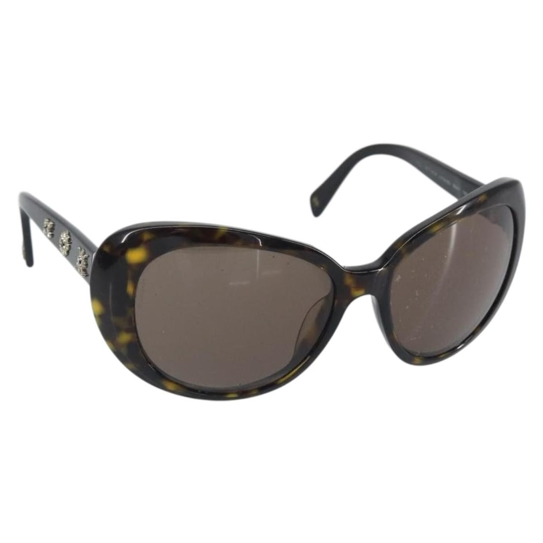 CHANEL black plastic women sunglasses with case Italy: CHANEL black plastic women sunglasses with case Italy These CHANEL sunglasses feature a classic black plastic frame and are designed for women. Made in Italy, they come with a sunglass case. The sungl