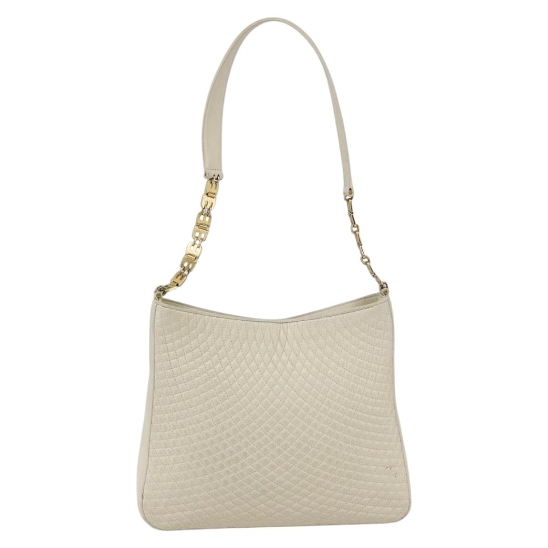 Vintage Quilted Leather Shoulder Bag by Bally in Ecru: Vintage Quilted Leather Shoulder Bag by Bally in Ecru This vintage Bally shoulder bag for women features quilted ecru leather and showcases classic Italian craftsmanship. The bag shows signs of wear i