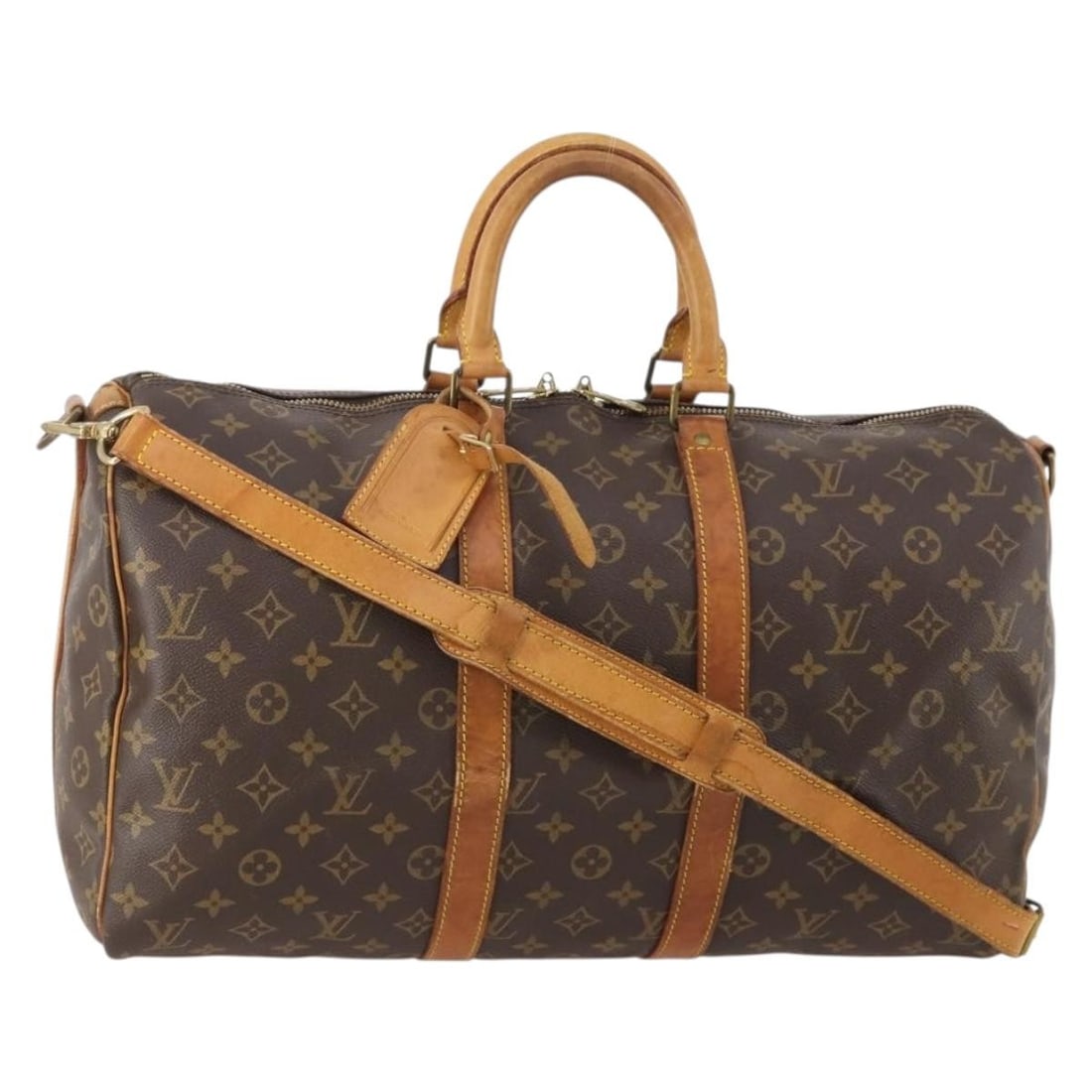 Louis Vuitton Keepall Bandouliere Monogram Canvas Travel Bag: Louis Vuitton Keepall Bandouliere Monogram Canvas Travel Bag This Louis Vuitton Keepall Bandouliere Bag features the iconic monogram canvas in brown and is designed for unisex use. The bag is crafted 