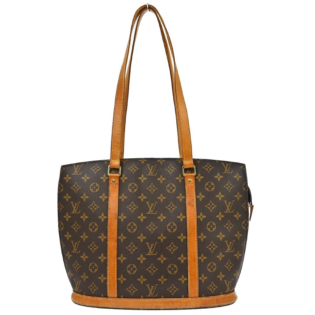 Louis Vuitton Babylone Monogram Canvas Tote Bag: Louis Vuitton Babylone Monogram Canvas Tote Bag This Louis Vuitton Babylone Hand Tote Bag features the iconic monogram canvas leather exterior in brown with beige double leather handles. Designed in a