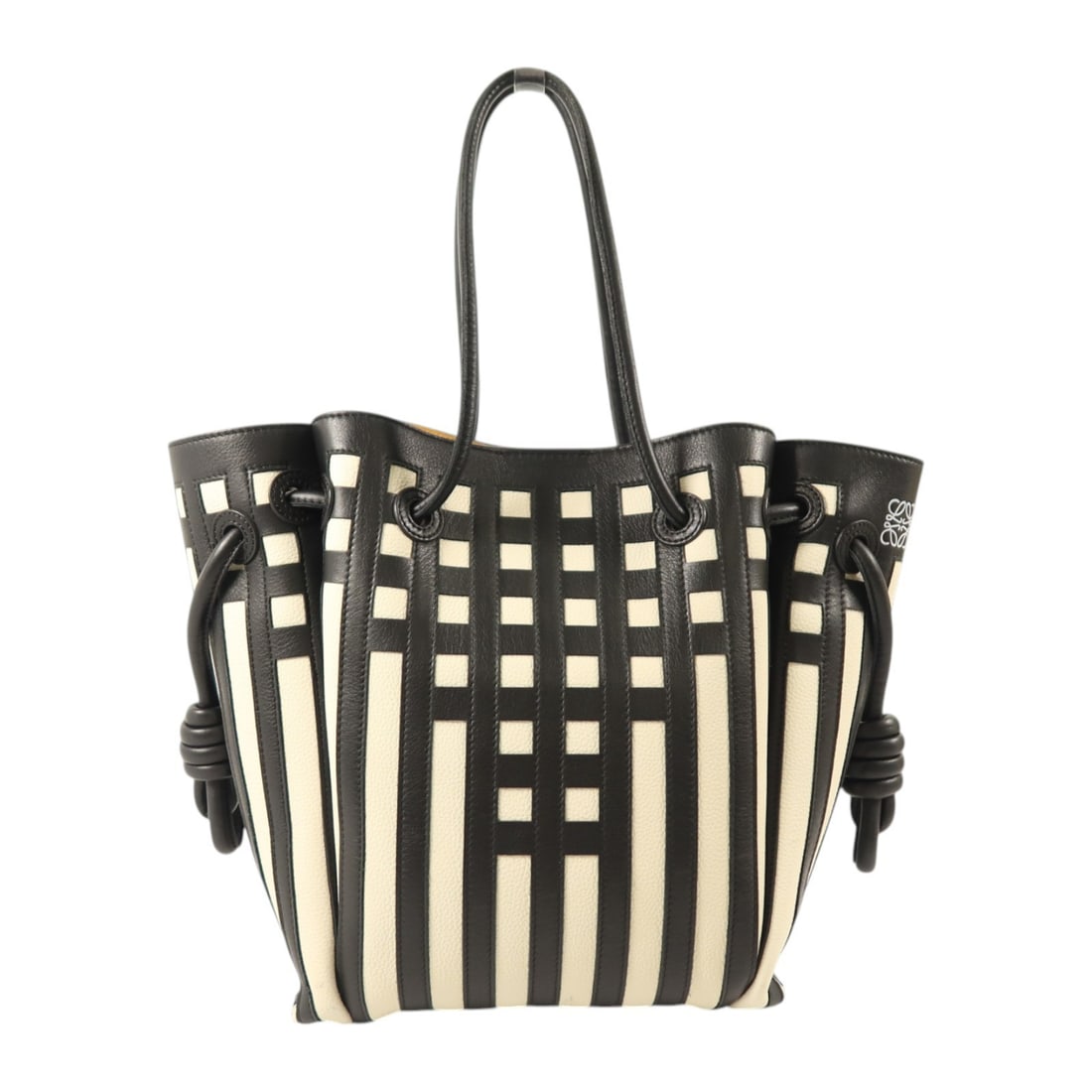 LOEWE Flamenco Knot black white calfskin tote shoulder bag: LOEWE Flamenco Knot black white calfskin tote shoulder bag This LOEWE Flamenco Knot Tote Shoulder Bag is crafted from high-quality calfskin leather in a sophisticated black and white design. Designed 