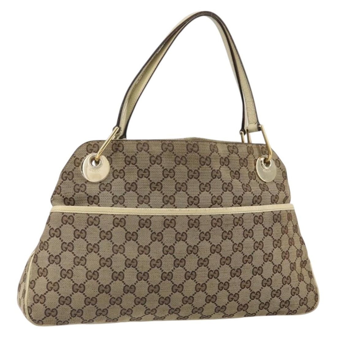 Beige Gold GG Canvas Tote by Gucci Model 121023 Made in Italy: Beige Gold GG Canvas Tote by Gucci Model 121023 Made in Italy This is a GUCCI GG Canvas Tote Bag in beige and gold, featuring the signature GG canvas material. The bag has a spacious main compartment 