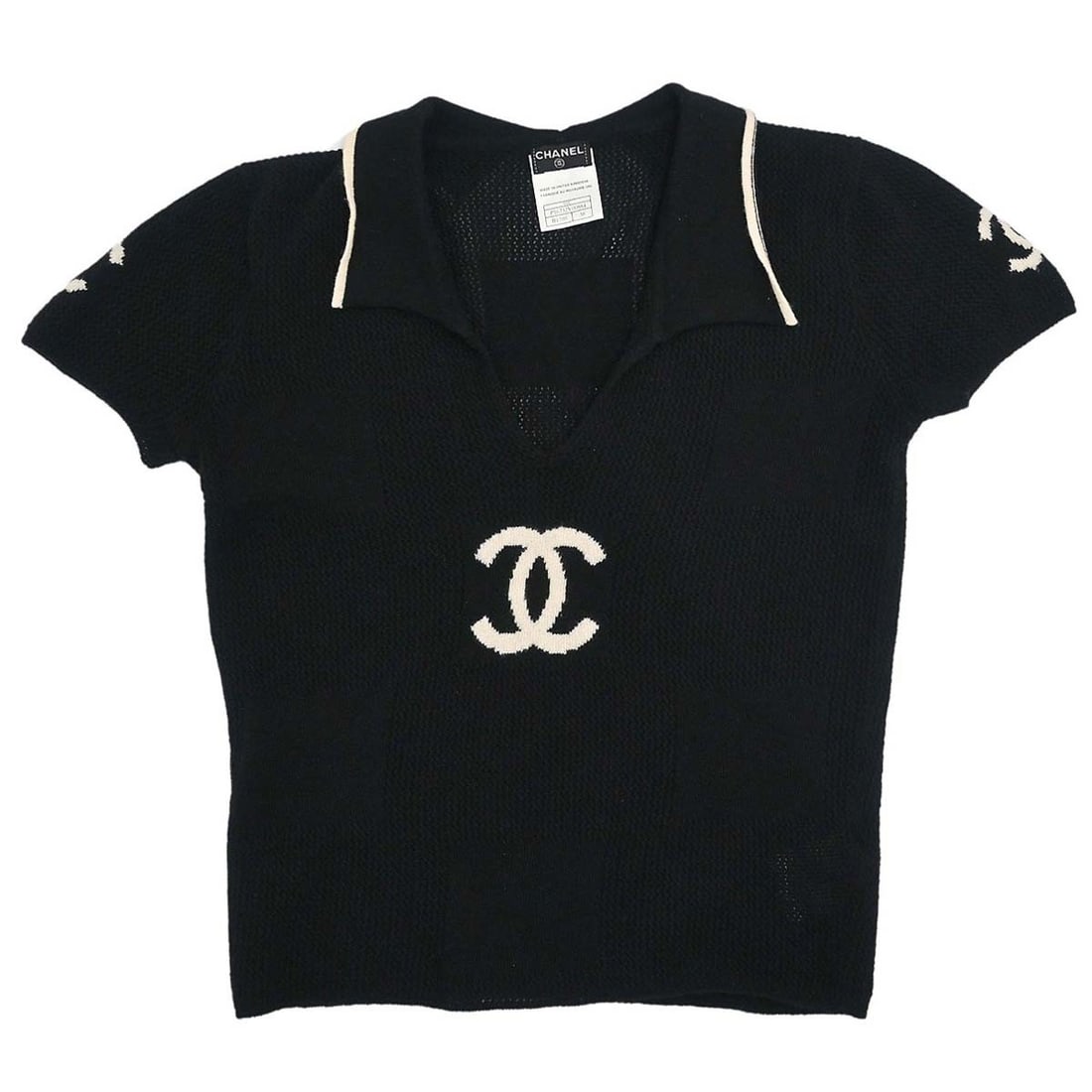 CHANEL Black Cashmere Knit Collared Short Sleeve Top EU 38: CHANEL Black Cashmere Knit Collared Short Sleeve Top EU 38 This Chanel short sleeve sweater knit top features a collared neckline and is crafted from 100% cashmere in black. Designed for a regular fit