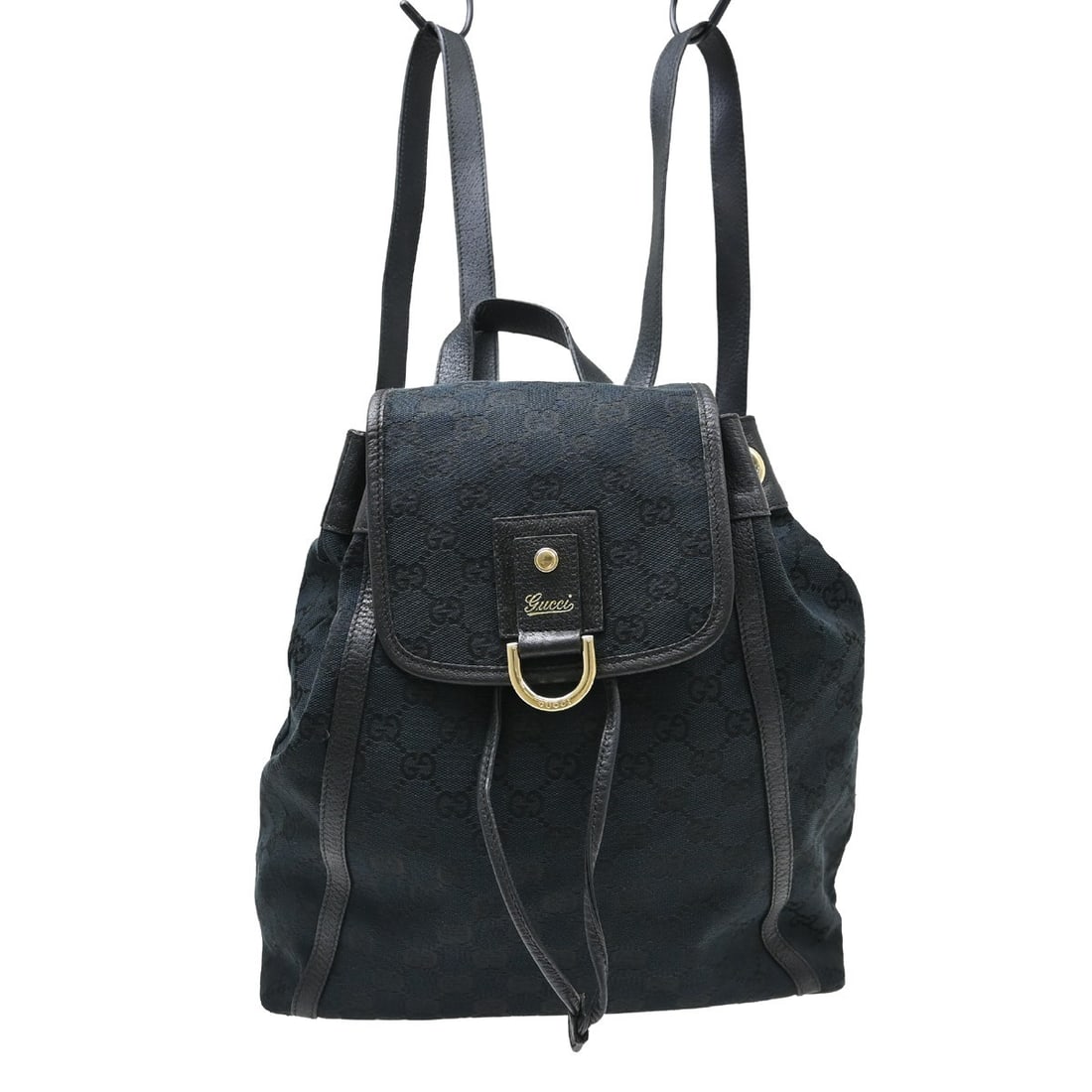 Gucci Black Canvas Leather Women Backpack 111044 002122: Gucci Black Canvas Leather Women Backpack 111044 002122 This Gucci backpack features a sleek black canvas and leather exterior, complemented by black handles and straps. Designed in a small size, it o