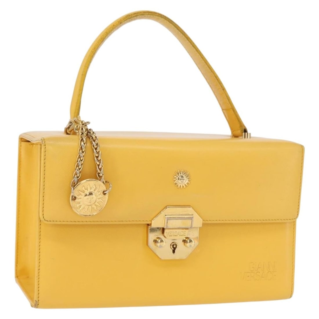 Gianni Versace Yellow Gold Leather Sunburst Hand Bag Auth BA8459: Gianni Versace Yellow Gold Leather Sunburst Hand Bag Auth BA8459 Introducing the Gianni Versace Sunburst Hand Bag, a stunning accessory that embodies luxury and style. Crafted from high-quality leathe