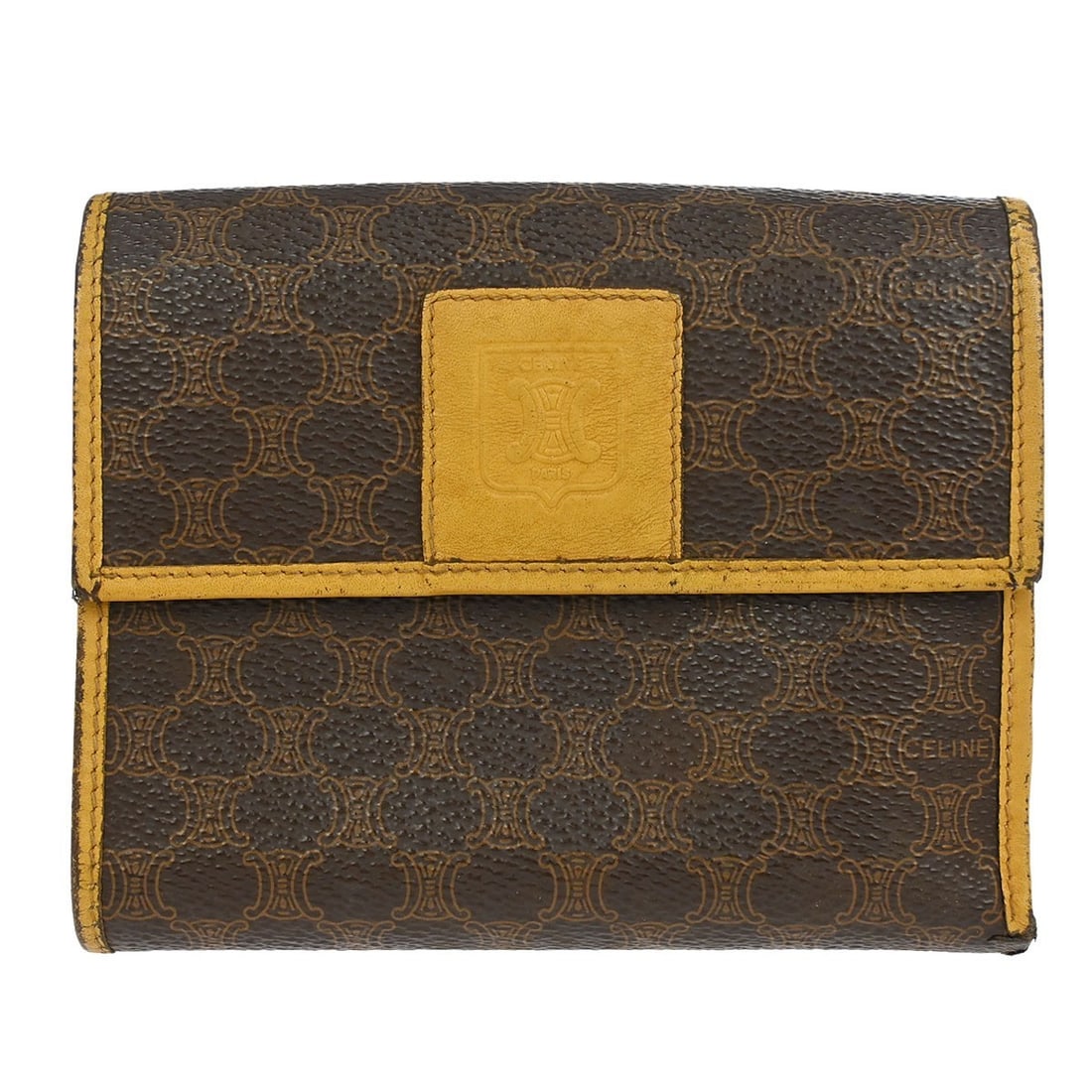 CELINE Brown PVC Macadam Wallet with Logo Accents: CELINE Brown PVC Macadam Wallet with Logo Accents This Celine Brown PVC Macadam Wallet is a stylish accessory featuring the iconic Macadam pattern. Crafted from durable leather PVC, it showcases a ric