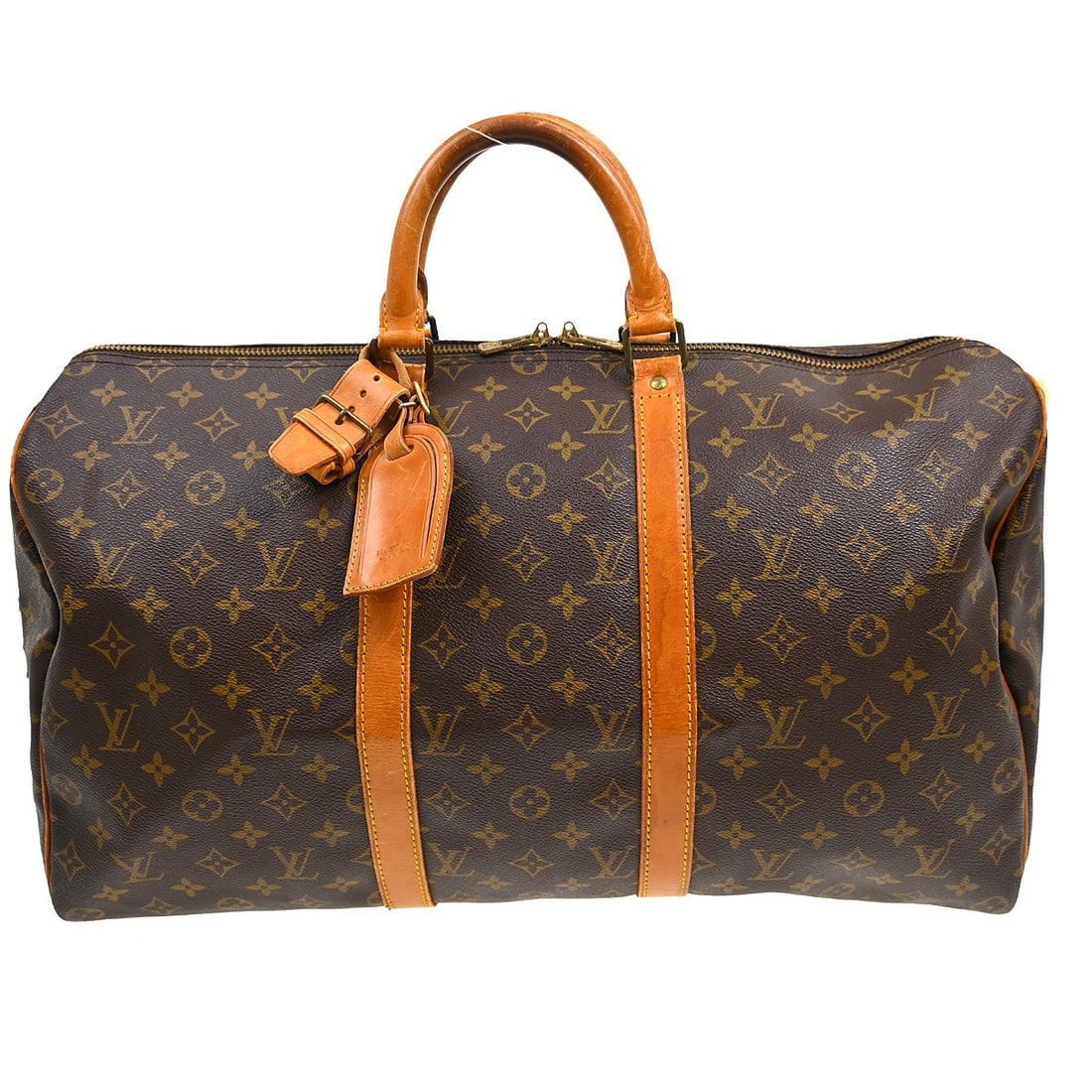 Louis Vuitton Keepall Monogram Canvas Duffel Bag 50cm: Louis Vuitton Keepall Monogram Canvas Duffel Bag 50cm This Louis Vuitton Keepall Bag features the classic monogram canvas in brown and is designed for unisex use. Made in France, the bag shows visible