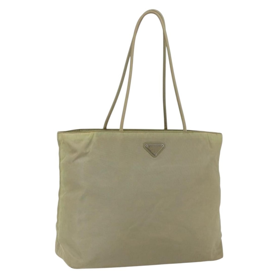 Cream Nylon PRADA Tote Bag with Silver Accents Made in Italy: Cream Nylon PRADA Tote Bag with Silver Accents Made in Italy This PRADA tote bag is crafted from cream nylon with silver tone accents. Made in Italy, it features dual top handles and a spacious main c