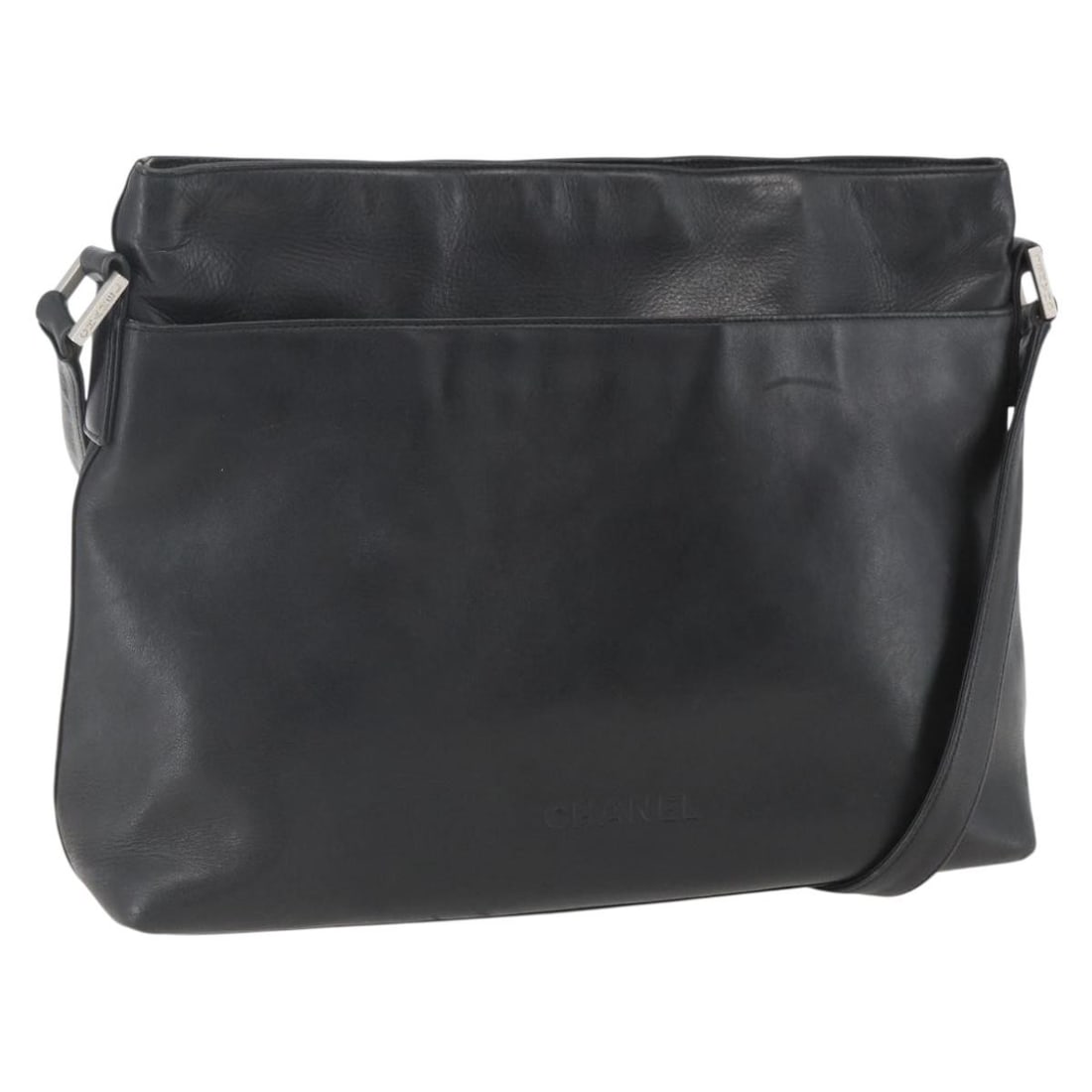 Black Leather CHANEL Shoulder Bag with Silver CC Logo France: Black Leather CHANEL Shoulder Bag with Silver CC Logo France This CHANEL shoulder bag is crafted from black leather with silver-tone CC details. Made in France, it features a spacious main compartment