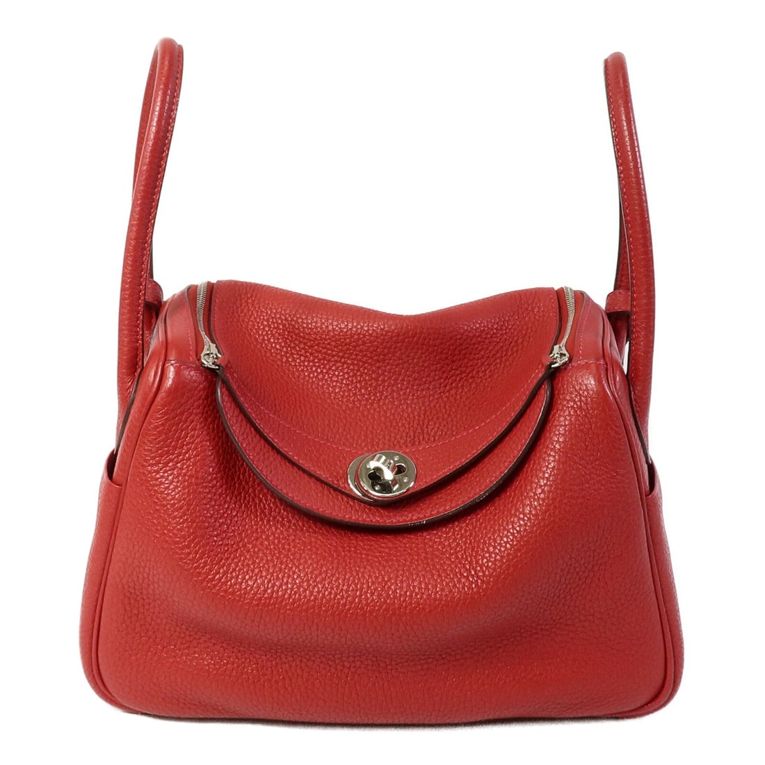 Hermes Lindy 26 Orange Clemence Leather 2way Shoulder Bag: Hermes Lindy 26 Orange Clemence Leather 2way Shoulder Bag This Hermes Lindy 26 is a versatile 2-way shoulder bag crafted from Clemence calfskin leather in Rouge Garance, a rich orange hue. Designed fo