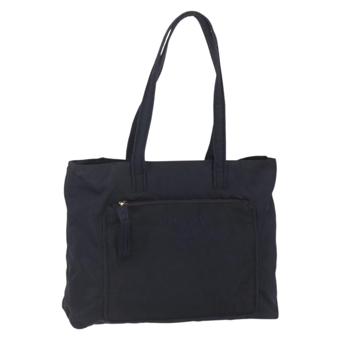 Prada Black Nylon Front Pocket Zip Tote Bag 40cm x 32cm: Prada Black Nylon Front Pocket Zip Tote Bag 40cm x 32cm This Prada Front Pocket Zip Tote is crafted from black nylon and designed for women. Featuring a spacious interior and a convenient front zip po