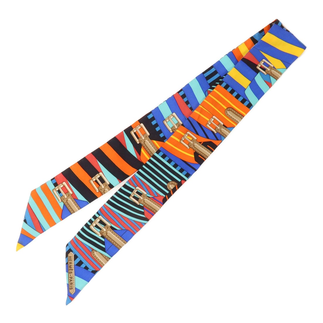 Hermes silk multicolor Twilly scarf: Hermes silk multicolor Twilly scarf This Hermes Twilly scarf is crafted from luxurious silk and features a vibrant multicolor design. Made in France, it offers a stylish accent for women's wardrobes a