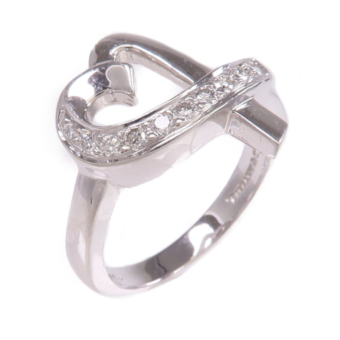 Diamond Ring in 18K White Gold Size 4.5 by Tiffany & Co.: Diamond Ring in 18K White Gold Size 4.5 by Tiffany & Co. This Tiffany & Co. ring features a diamond set in 18K white gold, designed for women. The ring is a US size 4.5 and showcases a clear stone wit