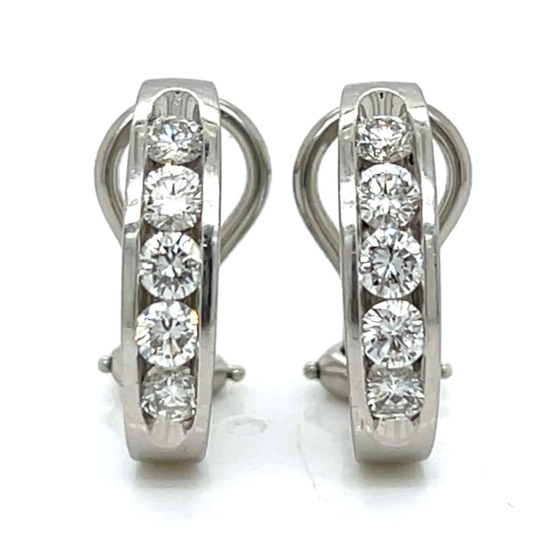 Elegant Platinum Diamond Earrings 1.20 Ct F-G VVS-VS 10 Diamonds: Elegant Platinum Diamond Earrings 1.20 Ct F-G VVS-VS 10 Diamonds These stunning platinum earrings are adorned with 10 diamonds, collectively weighing approximately 1.20 carats. The diamonds exhibit a 