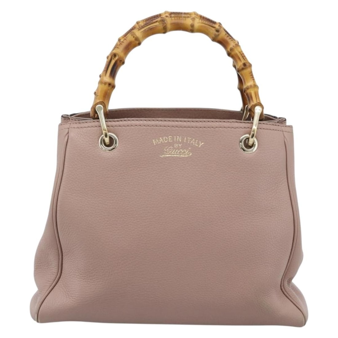 Gucci Bamboo Shopper pink leather tote: Gucci Bamboo Shopper pink leather tote This Gucci Bamboo Shopper Tote is crafted from pink leather and features signature bamboo handles. Made in Italy, the tote is designed for women and offers a spa