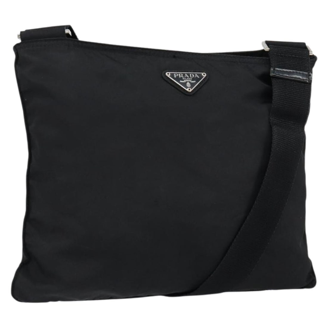 Prada nylon black silver shoulder bag Italy women: Prada nylon black silver shoulder bag Italy women This PRADA shoulder bag is crafted from black nylon with silver-tone accents. Made in Italy, it features an adjustable shoulder strap for versatile ca