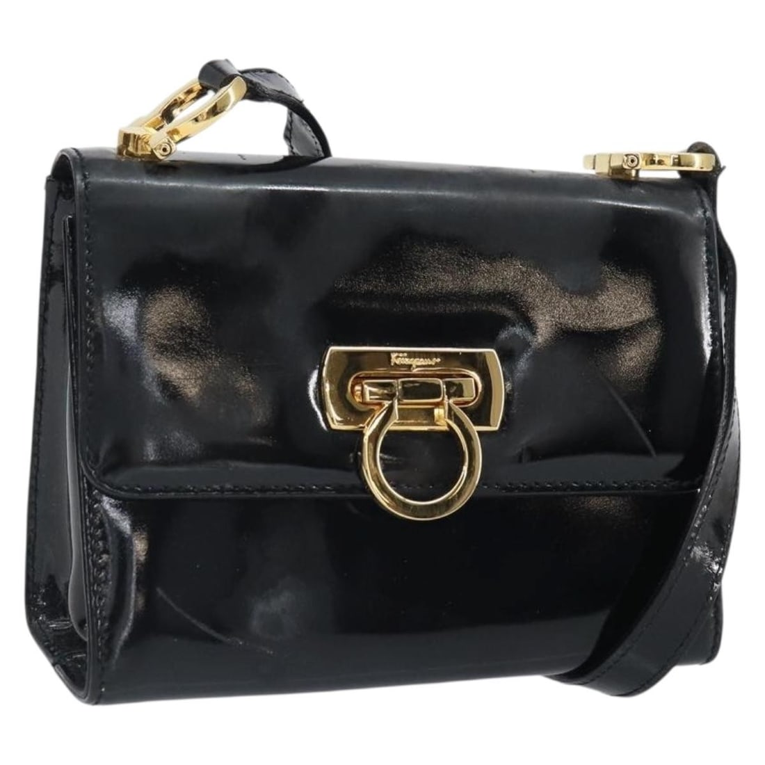 Black Patent Leather Gancini Shoulder Bag by Salvatore Ferragamo Gold Accents: Black Patent Leather Gancini Shoulder Bag by Salvatore Ferragamo Gold Accents This Salvatore Ferragamo Gancini shoulder bag features black and gold patent leather with a structured silhouette. Designe