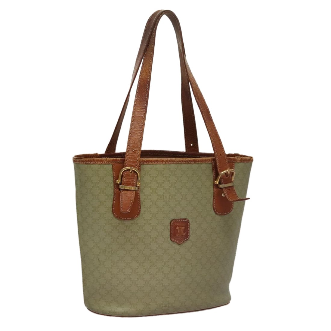 CELINE Beige Macadam Canvas Tote Bag Italy: CELINE Beige Macadam Canvas Tote Bag Italy This CELINE Macadam Canvas tote bag in beige features the iconic Macadam pattern and is crafted from durable canvas. Designed for women, it offers a spacious