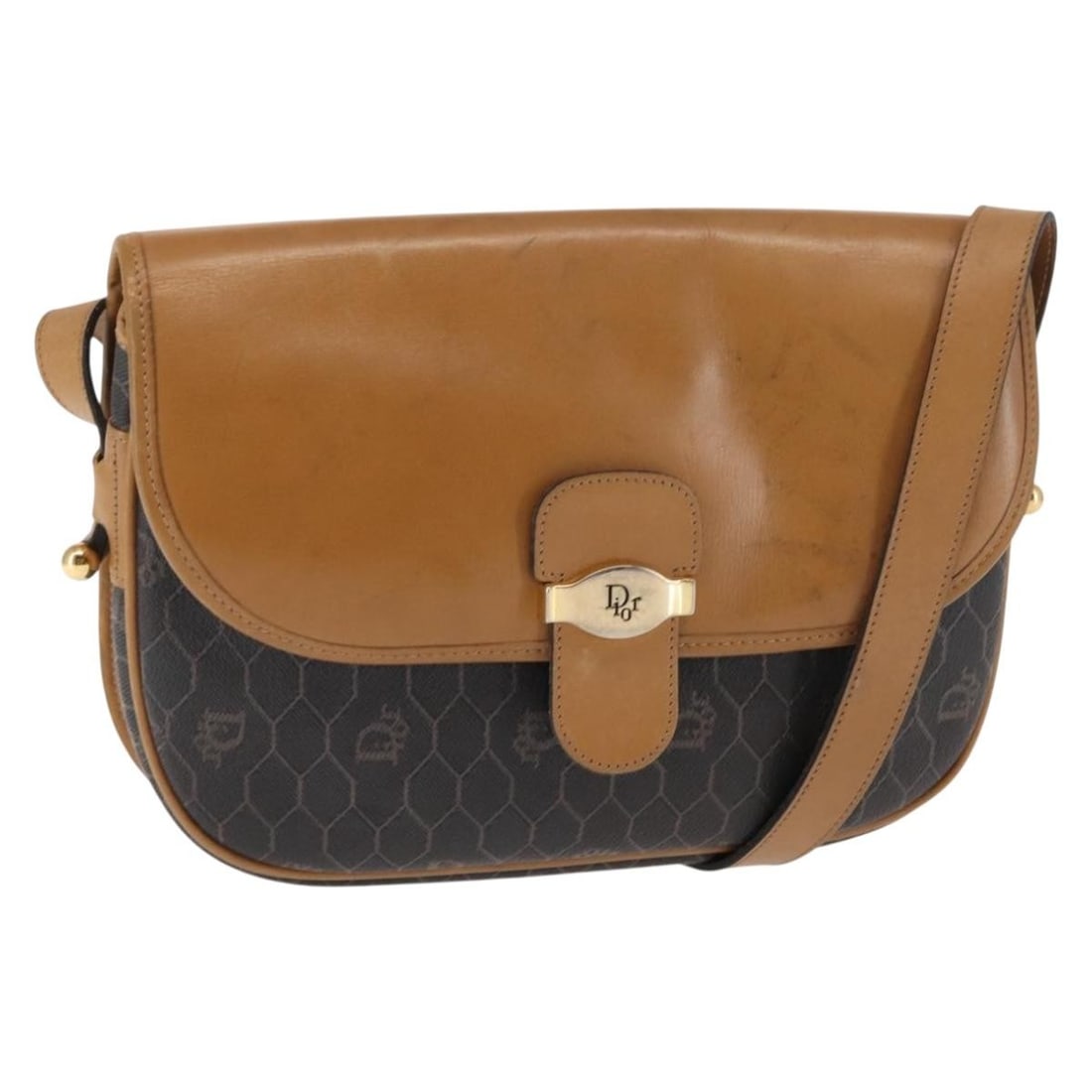 Christian Dior Honeycomb Canvas and Leather Shoulder Bag Vintage: Christian Dior Honeycomb Canvas and Leather Shoulder Bag Vintage This Christian Dior vintage Honeycomb shoulder bag features a brown canvas body with leather accents. Designed for women, this shoulder