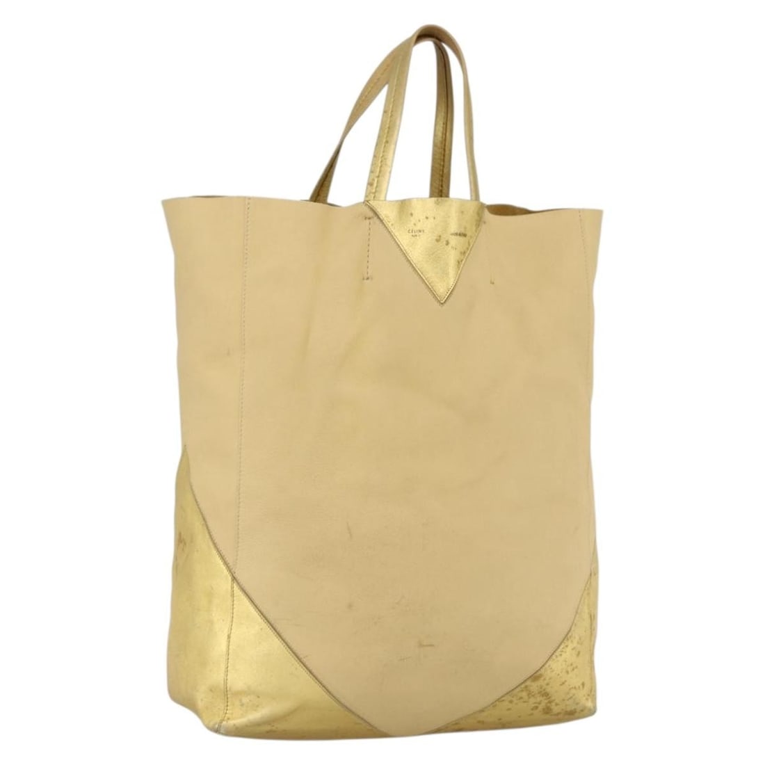 Celine Gold Leather Tote Bag for Women Made in Italy: Celine Gold Leather Tote Bag for Women Made in Italy This CELINE tote bag is crafted from gold-colored leather and designed for women. Made in Italy, it features a spacious interior with a practical h