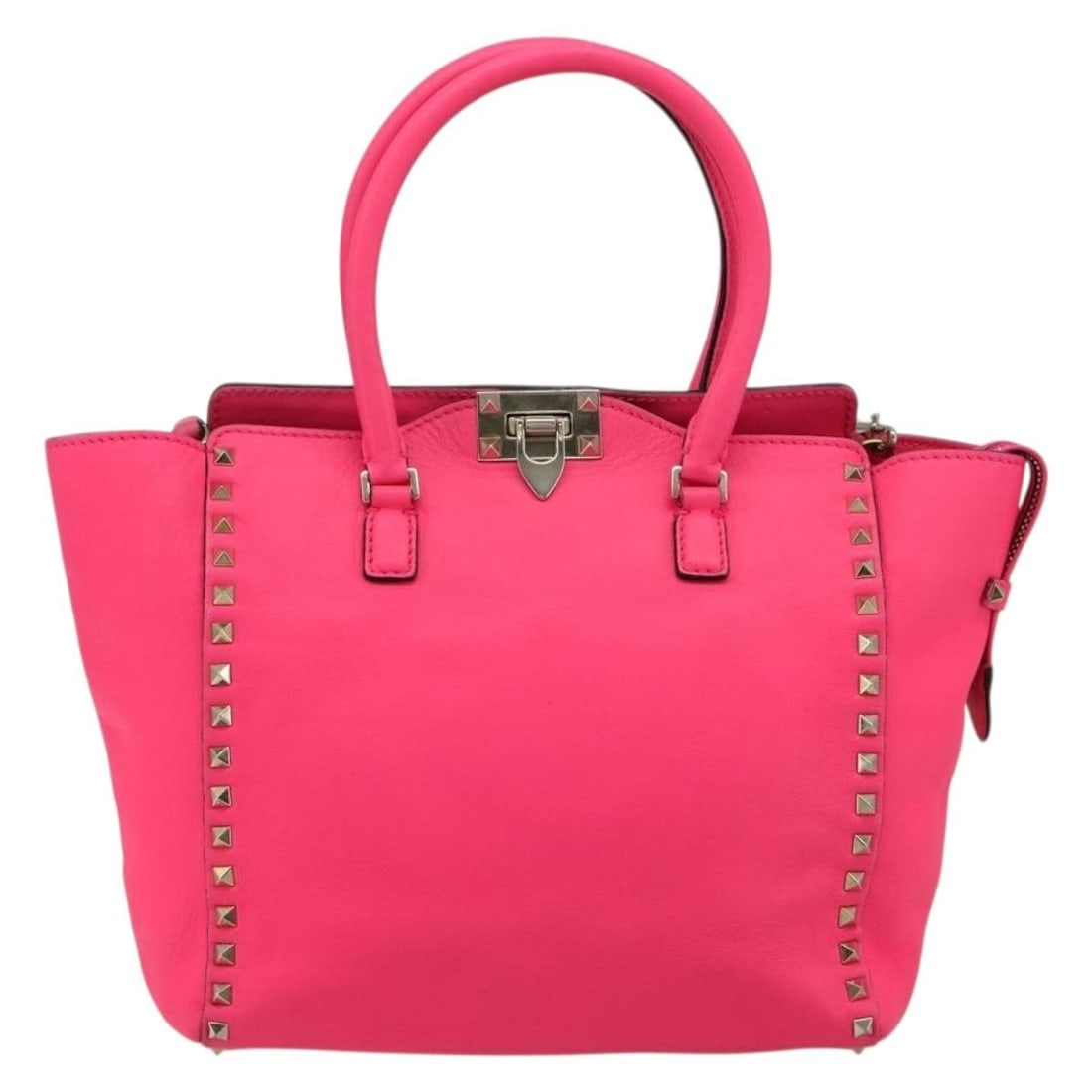 Valentino Garavani Rockstud pink leather tote: Valentino Garavani Rockstud pink leather tote This Valentino Garavani Rockstud Tote is crafted from soft pink leather and features the brand's signature stud detailing. Made in Italy, this tote offers