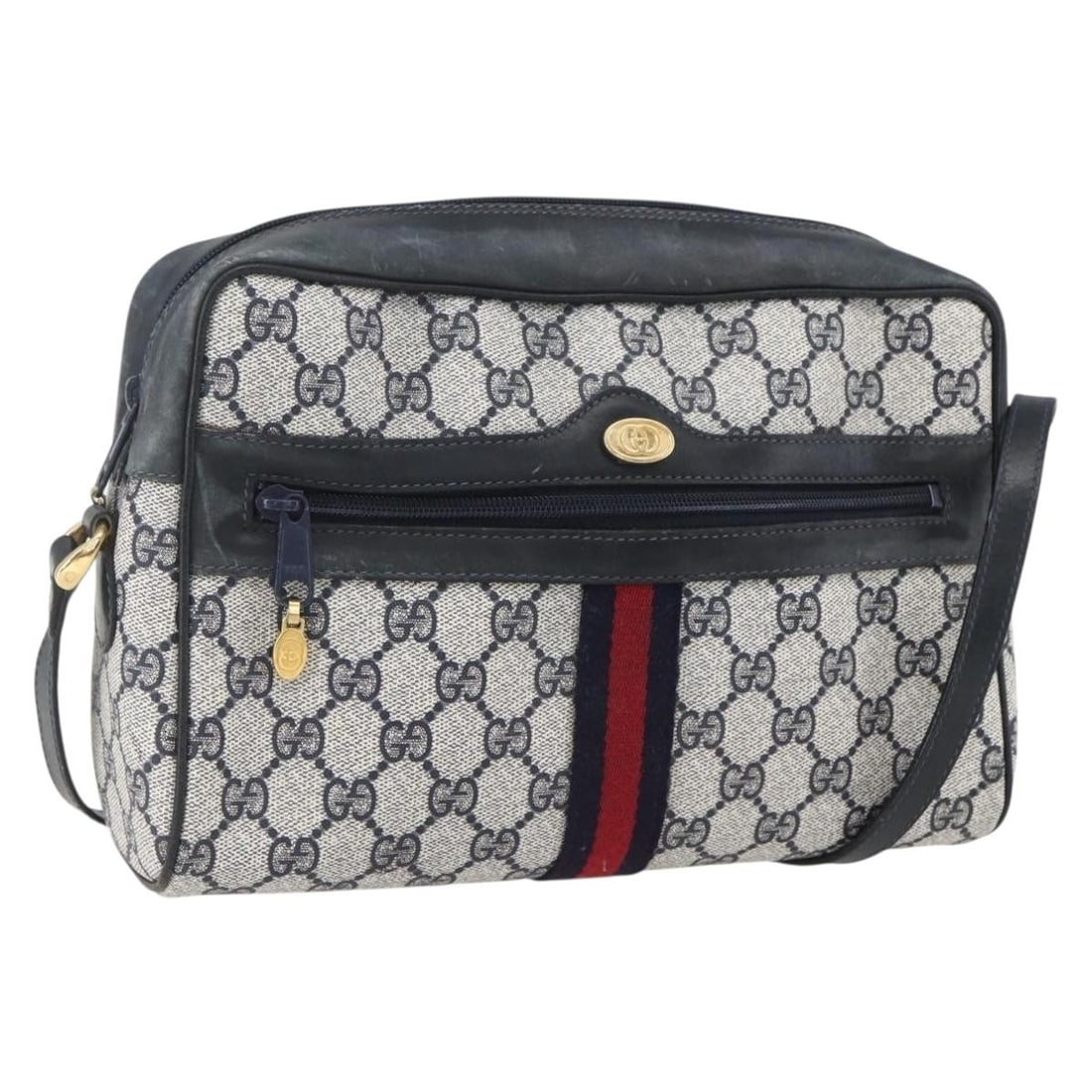 Gucci Sherry Line GG Supreme Navy PVC Shoulder Bag 42 01 4071: Gucci Sherry Line GG Supreme Navy PVC Shoulder Bag 42 01 4071 This is a Gucci GG Supreme Sherry Line shoulder bag crafted from navy and gold PVC leather with GG canvas detailing. The bag features a st