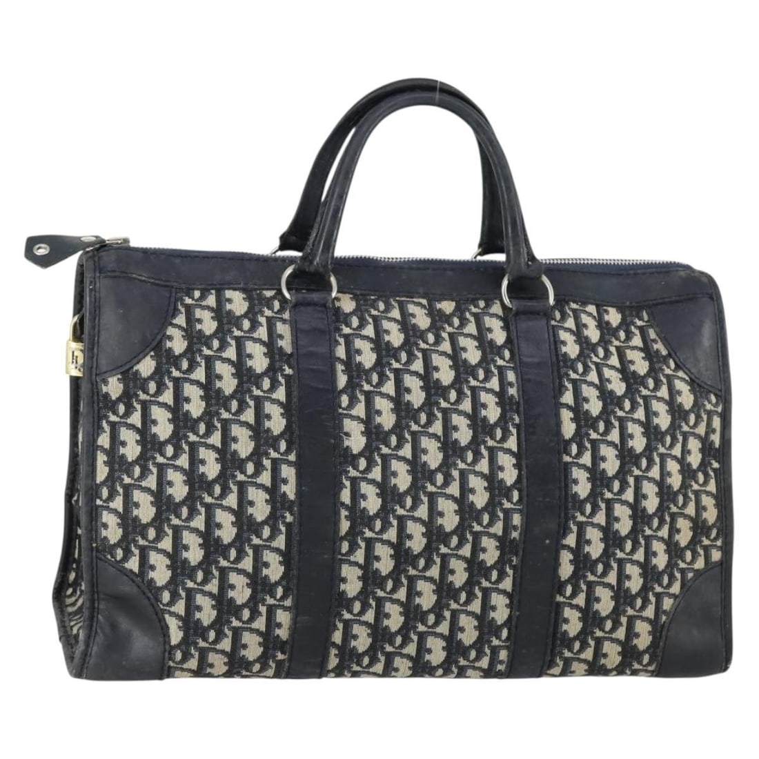 Christian Dior Navy Trotter Canvas Hand Bag Made in France: Christian Dior Navy Trotter Canvas Hand Bag Made in France This authentic Christian Dior Trotter Canvas Hand Bag is a stylish accessory crafted in France. The exterior is made from durable Trotter can