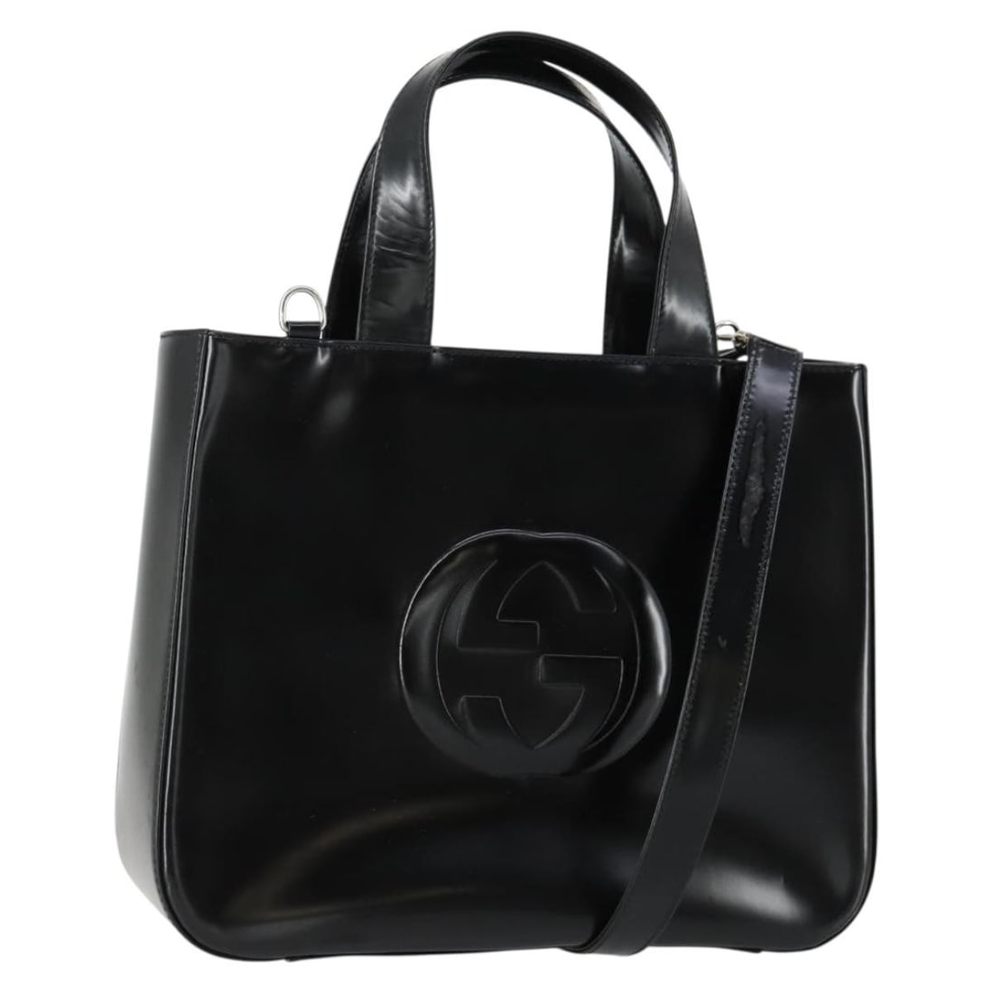 Gucci patent leather black silver shoulder bag with strap: Gucci patent leather black silver shoulder bag with strap This GUCCI handbag is crafted from black and silver patent leather and offers versatile 2-way carrying options with both a handle and a detach