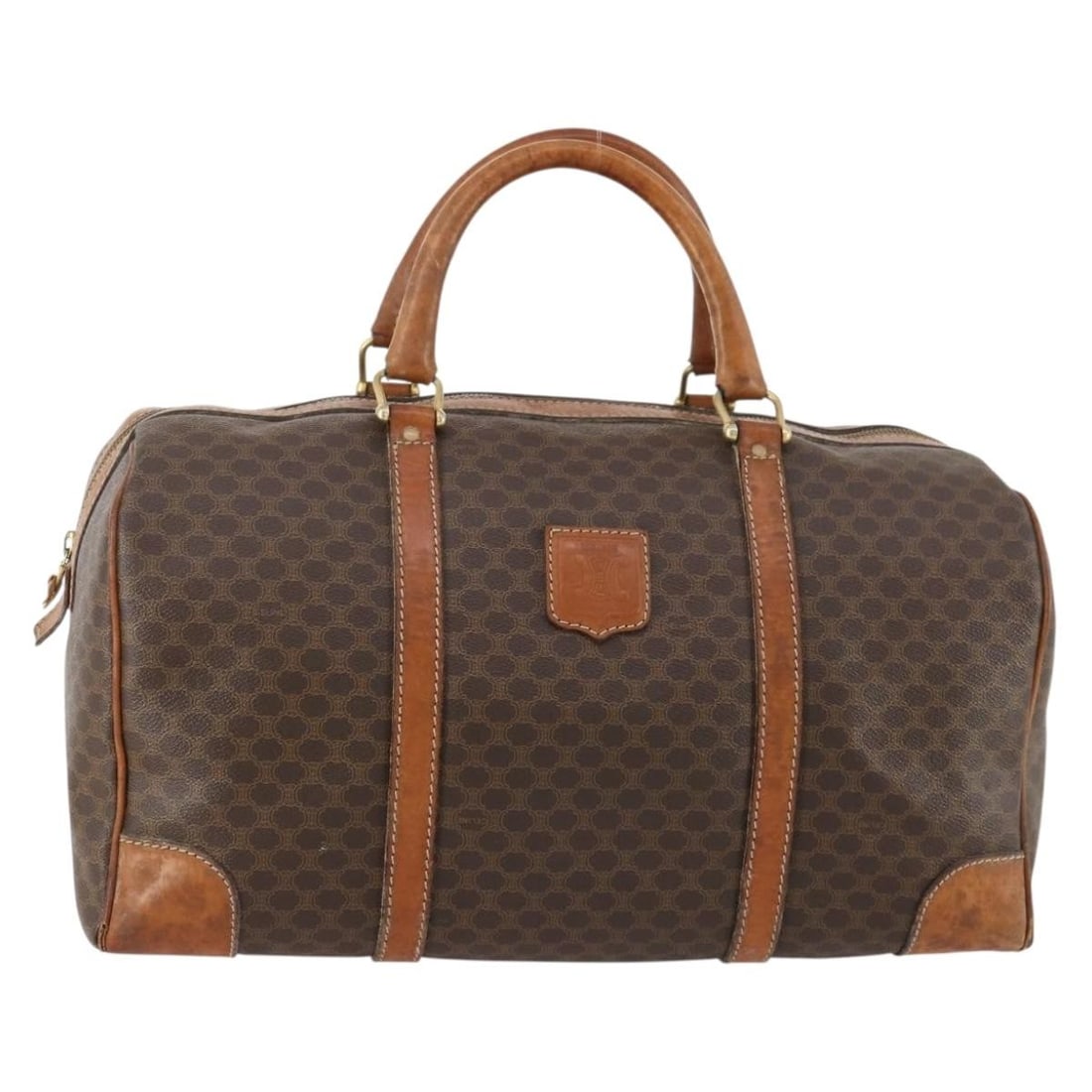 CELINE Macadam Canvas Brown Gold Boston Bag Italy: CELINE Macadam Canvas Brown Gold Boston Bag Italy This CELINE Boston Bag features the iconic Macadam canvas with PVC leather accents in a brown and gold color scheme. Designed for women, it is crafted