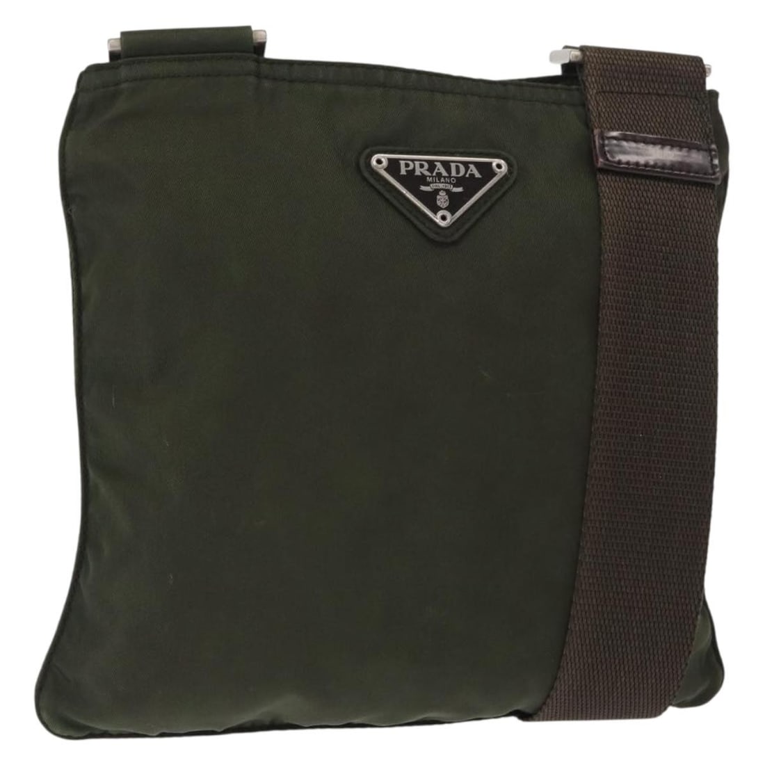 Prada Khaki Silver Nylon Women Shoulder Bag Italy: Prada Khaki Silver Nylon Women Shoulder Bag Italy This PRADA shoulder bag is crafted from durable nylon in a khaki and silver color combination. Made in Italy, it features an adjustable shoulder strap