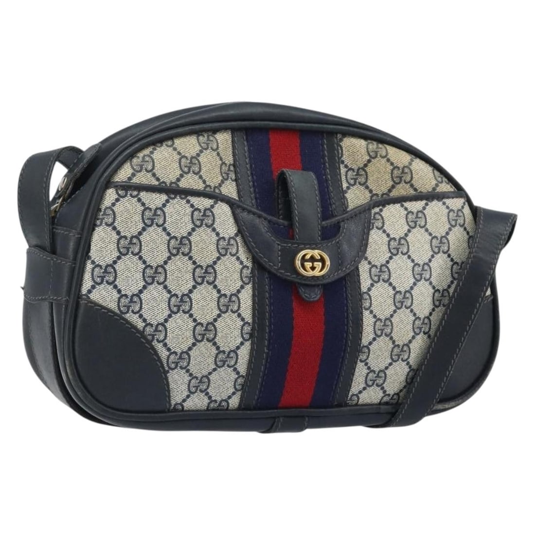 Gucci Sherry Line Navy Gold PVC Shoulder Bag: Gucci Sherry Line Navy Gold PVC Shoulder Bag This is a GUCCI GG Supreme Sherry Line shoulder bag crafted from navy and gold PVC leather with GG canvas accents. The bag features a structured silhouette