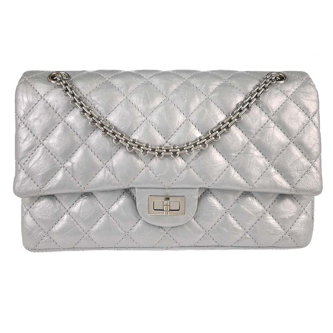 Chanel 2.55 Reissue quilted aged calfskin flap bag: Chanel 2.55 Reissue quilted aged calfskin flap bag This Chanel Reissue 2.55 Double Compartment Flap Bag is crafted from quilted aged calfskin in a sophisticated silver color. Designed for women, it fe