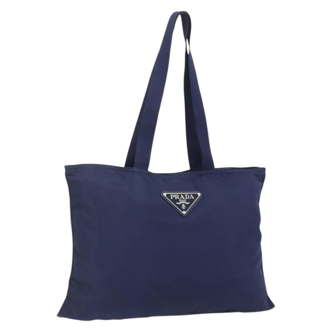 Prada Navy Silver Nylon Tote Bag Italy 19.7 x 15.7 inch: Prada Navy Silver Nylon Tote Bag Italy 19.7 x 15.7 inch This PRADA tote bag is crafted from navy nylon with silver accents and features a spacious design ideal for daily use. Made in Italy, the bag is