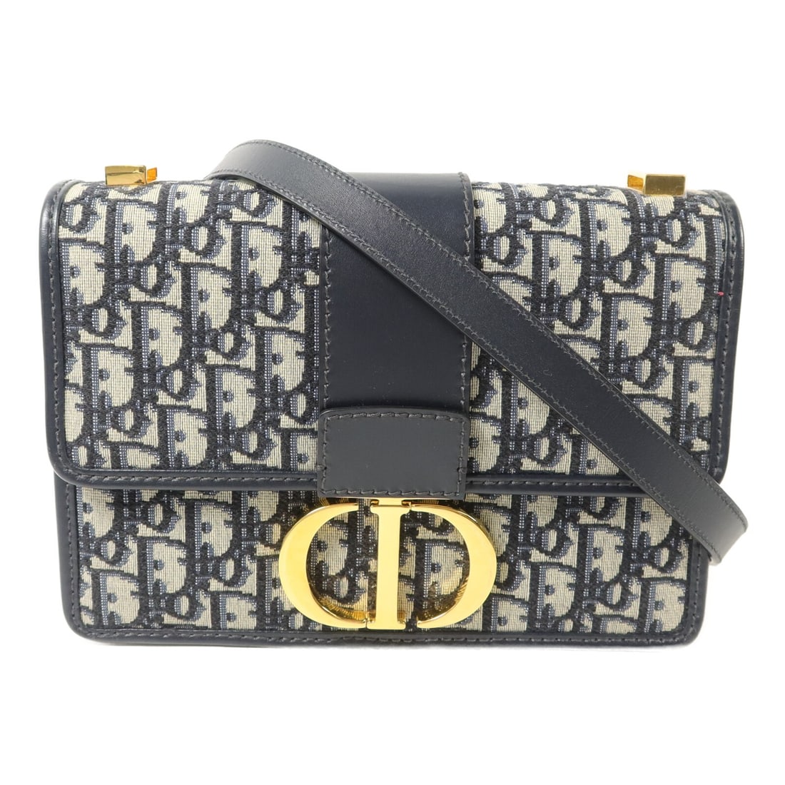 Dior 30 Montaigne Navy Canvas Shoulder Bag GHW: Dior 30 Montaigne Navy Canvas Shoulder Bag GHW This Christian Dior 30 Montaigne shoulder bag features the iconic Dior Oblique canvas in navy, complemented by gold-tone hardware. Designed for women, th