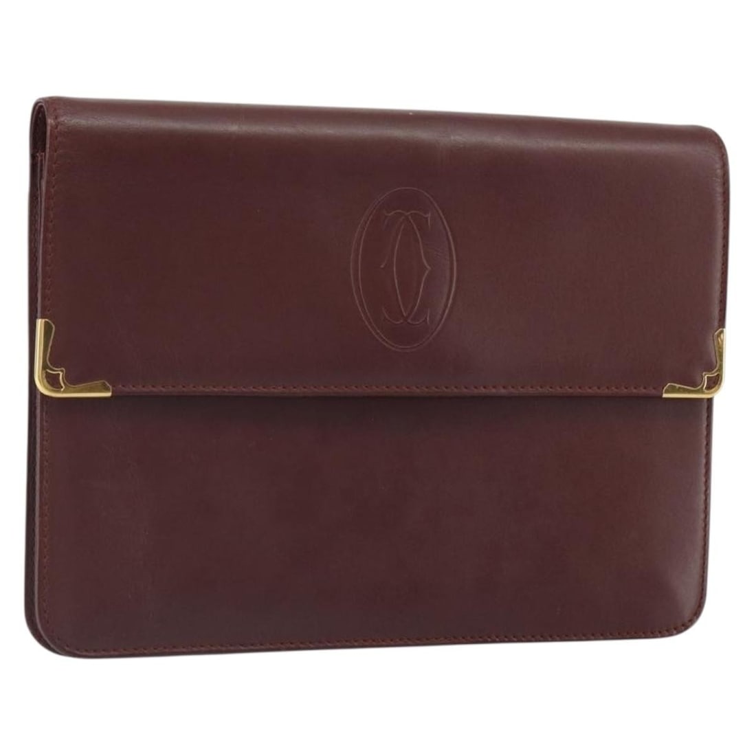 Cartier Must Line Bordeaux Leather Clutch with Gold Accents: Cartier Must Line Bordeaux Leather Clutch with Gold Accents This Cartier Must Line clutch bag features a Bordeaux leather exterior with gold-tone accents. Made in Italy, it has a compact design suitab