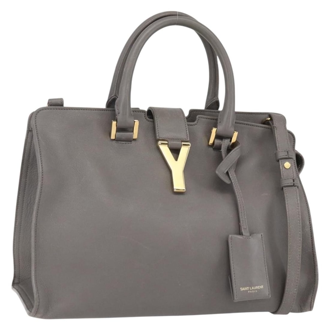 Classic Y Cabas gray leather handbag by Saint Laurent: Classic Y Cabas gray leather handbag by Saint Laurent The Saint Laurent Classic Y Cabas is crafted in gray leather and designed for women. This pre-owned bag is in fair condition, exhibiting significa