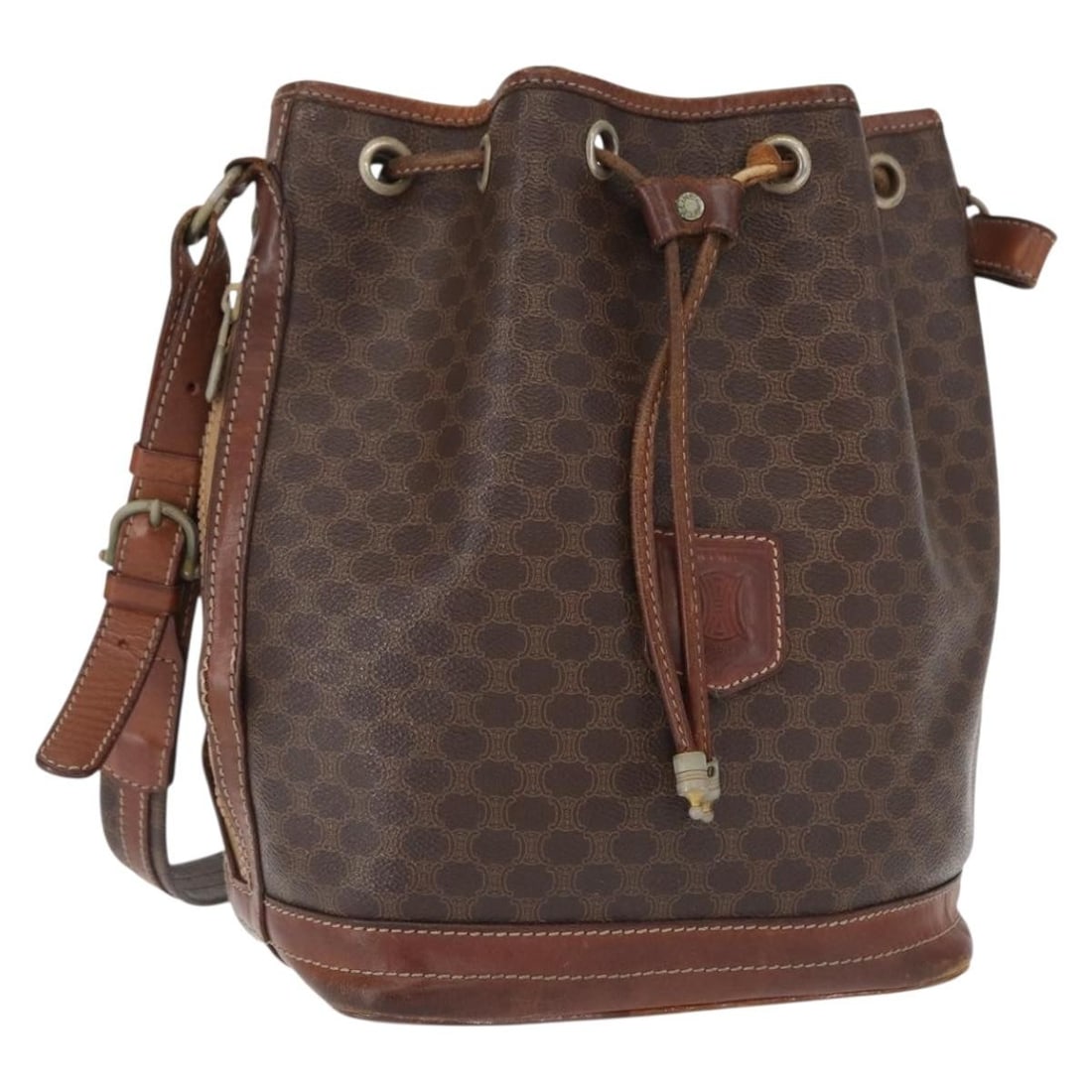 Celine Macadam Brown PVC Leather Shoulder Bag Gold Accents: Celine Macadam Brown PVC Leather Shoulder Bag Gold Accents This CELINE Macadam shoulder bag is crafted from PVC leather and features the iconic Macadam canvas in a brown and gold color scheme. Designe
