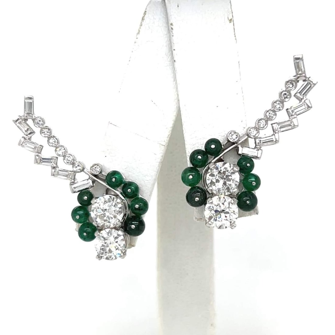 Vintage Art Deco Platinum Diamond and Emerald Earrings 1.25 inches: Vintage Art Deco Platinum Diamond and Emerald Earrings 1.25 inches Experience the elegance of Art Deco design with these stunning platinum earrings, featuring a captivating combination of diamonds and