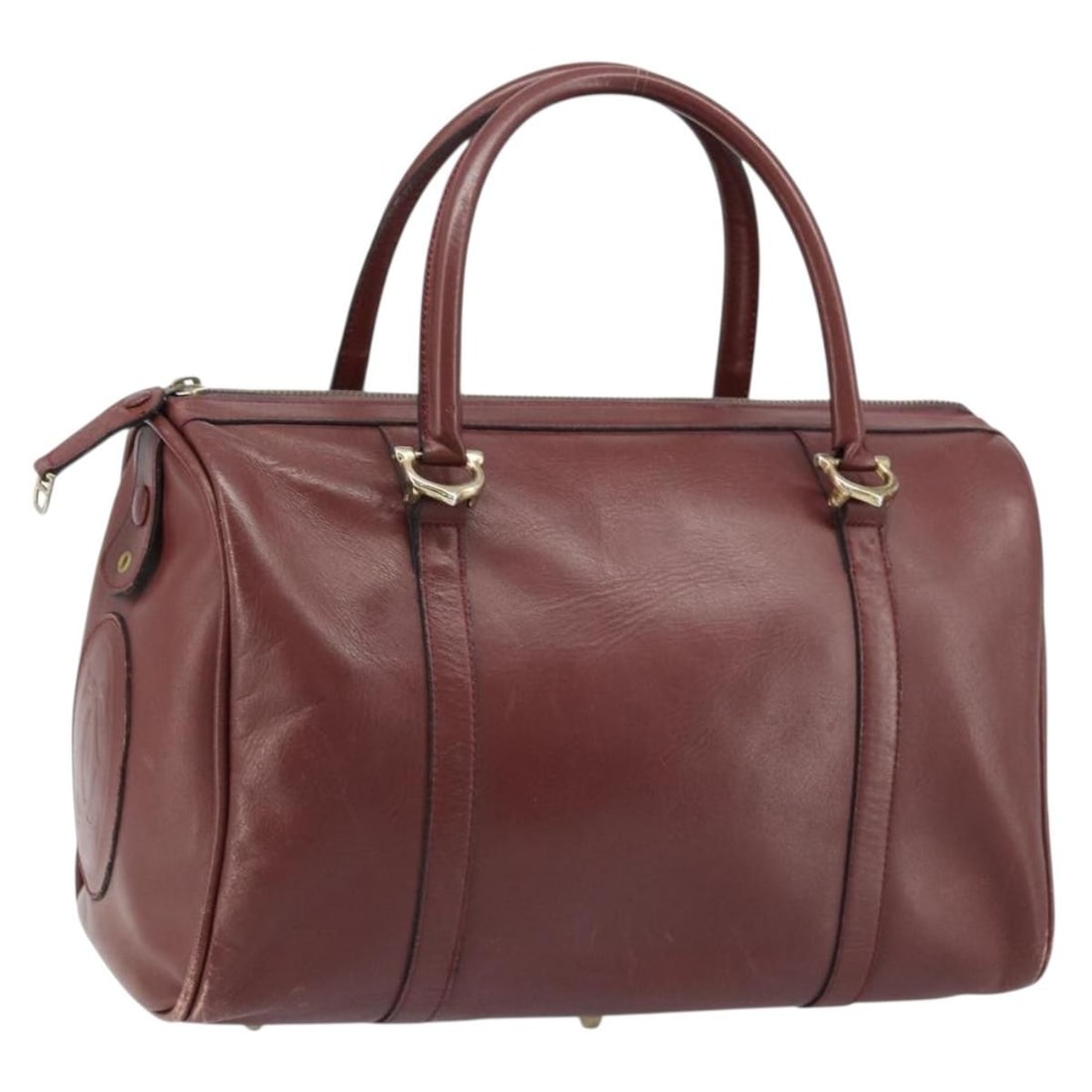 Cartier Must Line Bordeaux Leather Handbag Gold Trim: Cartier Must Line Bordeaux Leather Handbag Gold Trim This Cartier Must Line handbag is crafted from leather in a Bordeaux and gold color combination. Designed for women, it features a structured silho