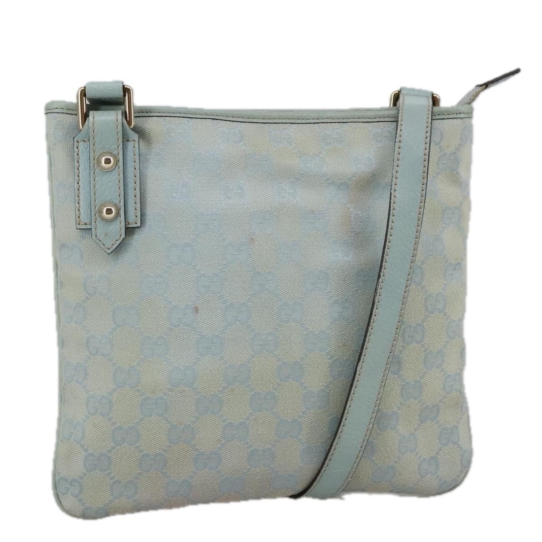 GUCCI Light Blue Gold GG Canvas Shoulder Bag 257246: GUCCI Light Blue Gold GG Canvas Shoulder Bag 257246 This GUCCI GG Canvas Shoulder Bag features a light blue and gold color scheme with the iconic GG canvas material. Designed for women, the bag is mad