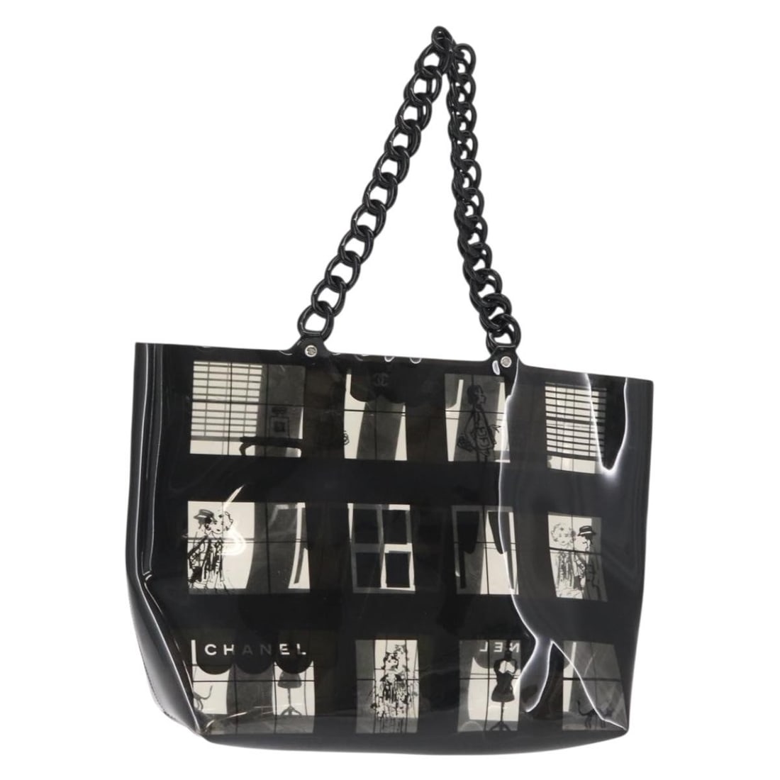 Chanel Black Vinyl Tote Bag with Chain Handles Window Line Collection: Chanel Black Vinyl Tote Bag with Chain Handles Window Line Collection This CHANEL Window Line Chain Tote Bag features a black vinyl exterior and classic CC design. Crafted in Italy, the tote offers a 