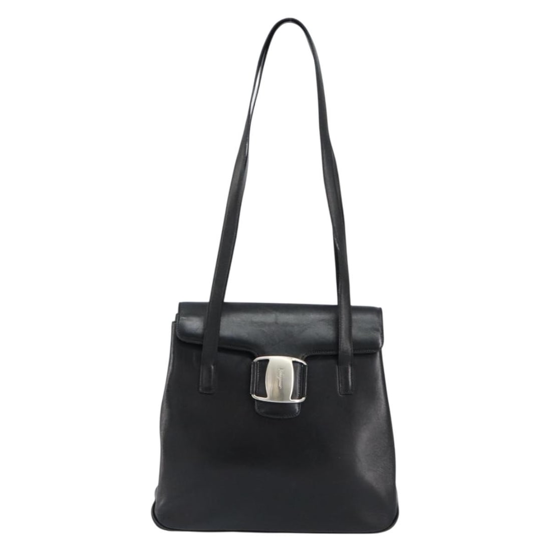 Black Leather Vala Shoulder Bag by Salvatore Ferragamo: Black Leather Vala Shoulder Bag by Salvatore Ferragamo This Salvatore Ferragamo Vala shoulder bag is crafted from black leather and designed for women. It features a spacious tote style suitable for e