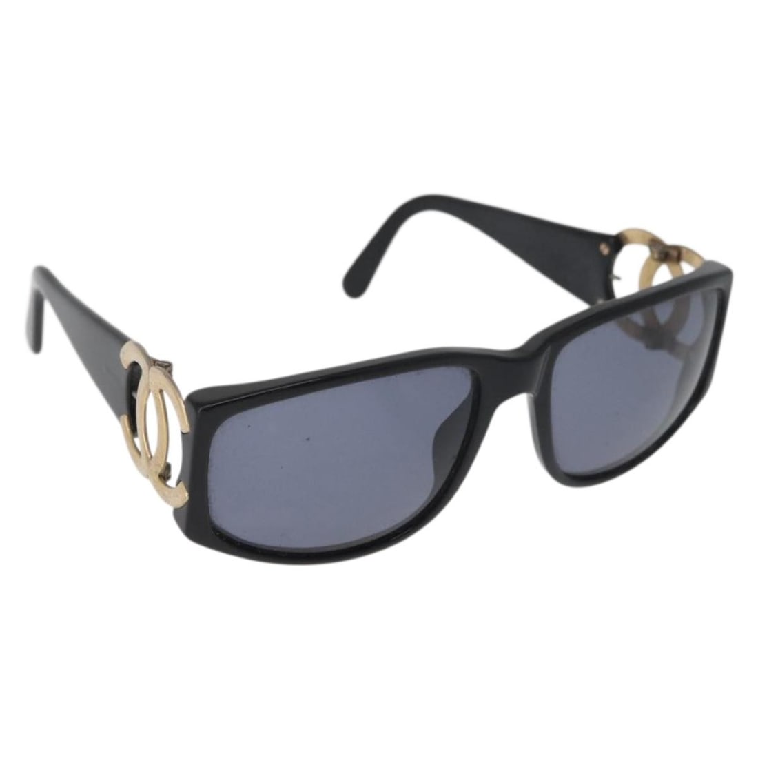 Black CHANEL plastic women sunglasses Italy: Black CHANEL plastic women sunglasses Italy These CHANEL sunglasses feature a classic black plastic frame and are designed for women. The item is heavily used, showing notable rubbing and scratches on