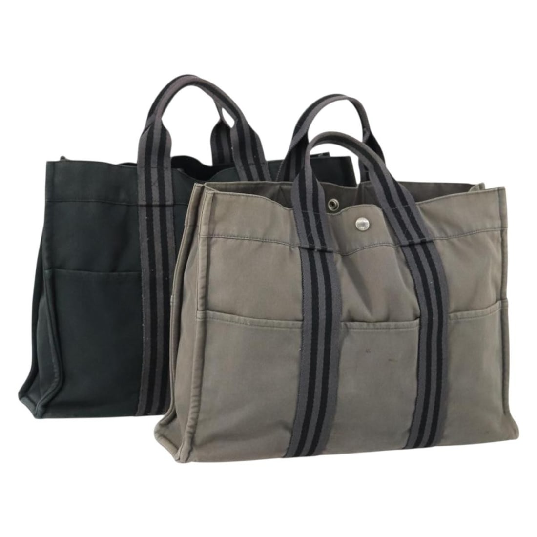 Set of 2 Hermes Fourre Tout MM Gray Black Canvas Tote Bags: Set of 2 Hermes Fourre Tout MM Gray Black Canvas Tote Bags This is an HERMES Fourre Tout MM Tote Bag 2-piece set crafted from canvas in gray and black. The set shows significant signs of use, includin