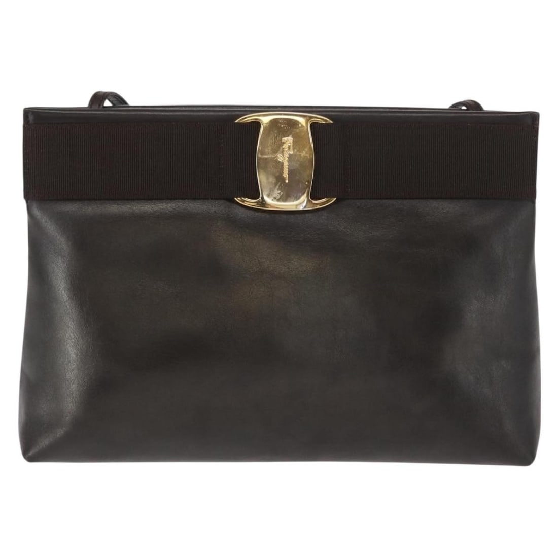 Vala Shoulder Bag in Brown Leather by Salvatore Ferragamo: Vala Shoulder Bag in Brown Leather by Salvatore Ferragamo The Salvatore Ferragamo Vala Shoulder Bag is crafted from brown leather and designed for women. This Italian-made bag features a classic shoul