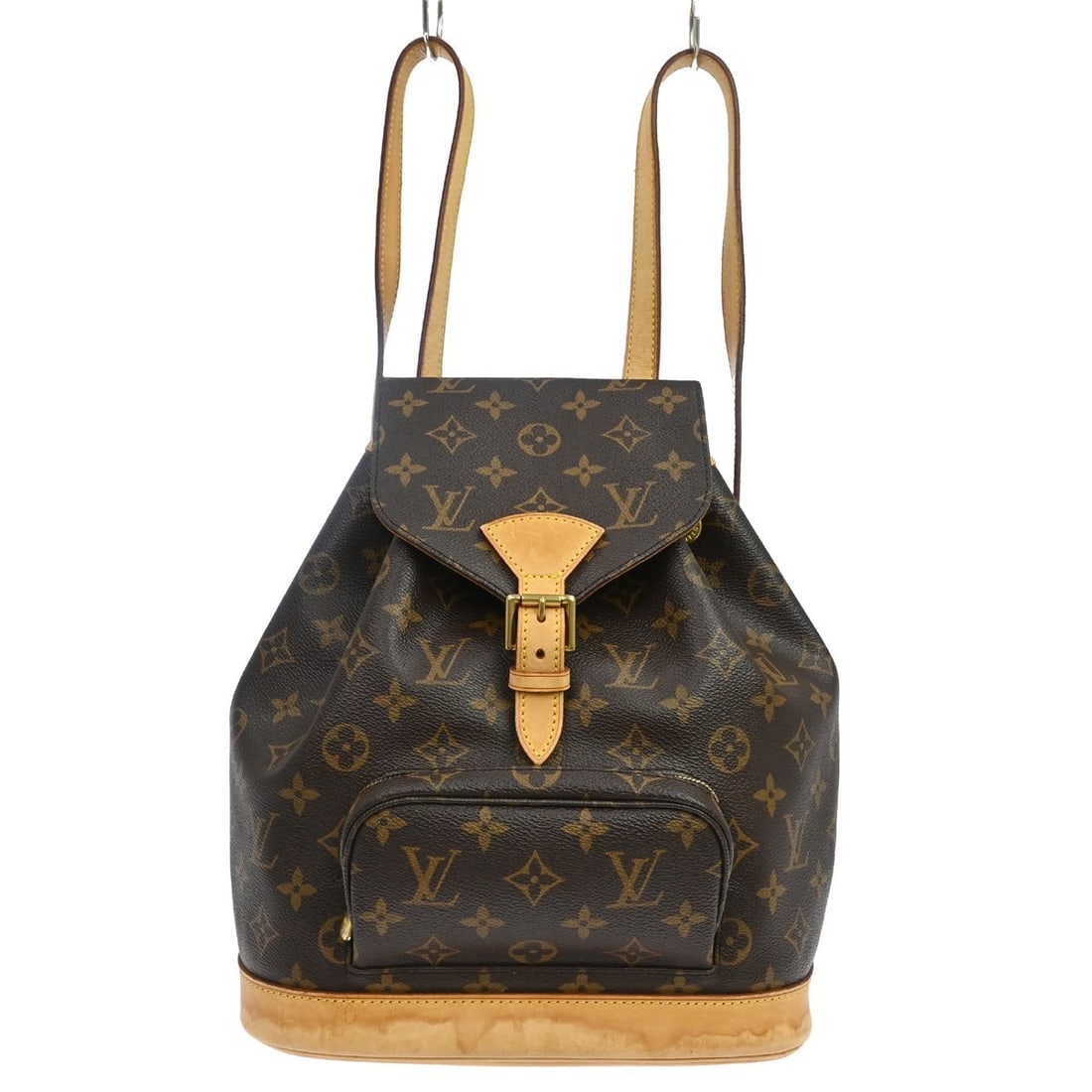 Louis Vuitton Montsouris monogram canvas backpack: Louis Vuitton Montsouris monogram canvas backpack This Louis Vuitton Vintage Montsouris Backpack features the iconic monogram canvas in brown and is designed for women. The bag shows significant signs